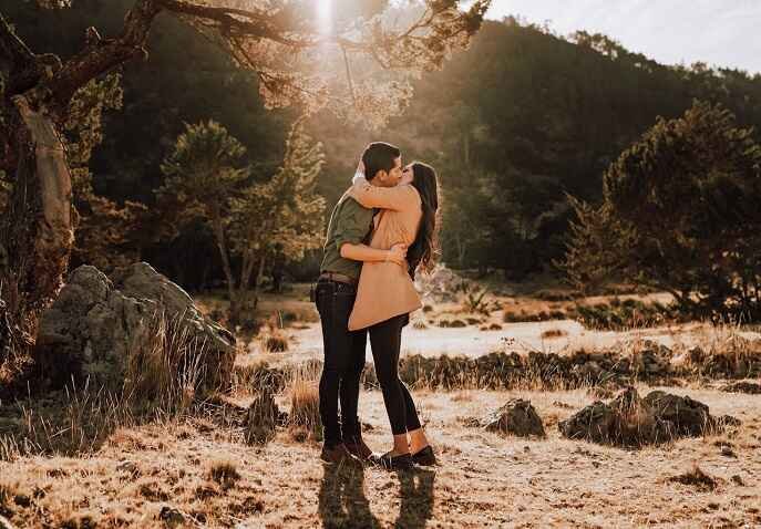 A couple sharing quality time in a forest